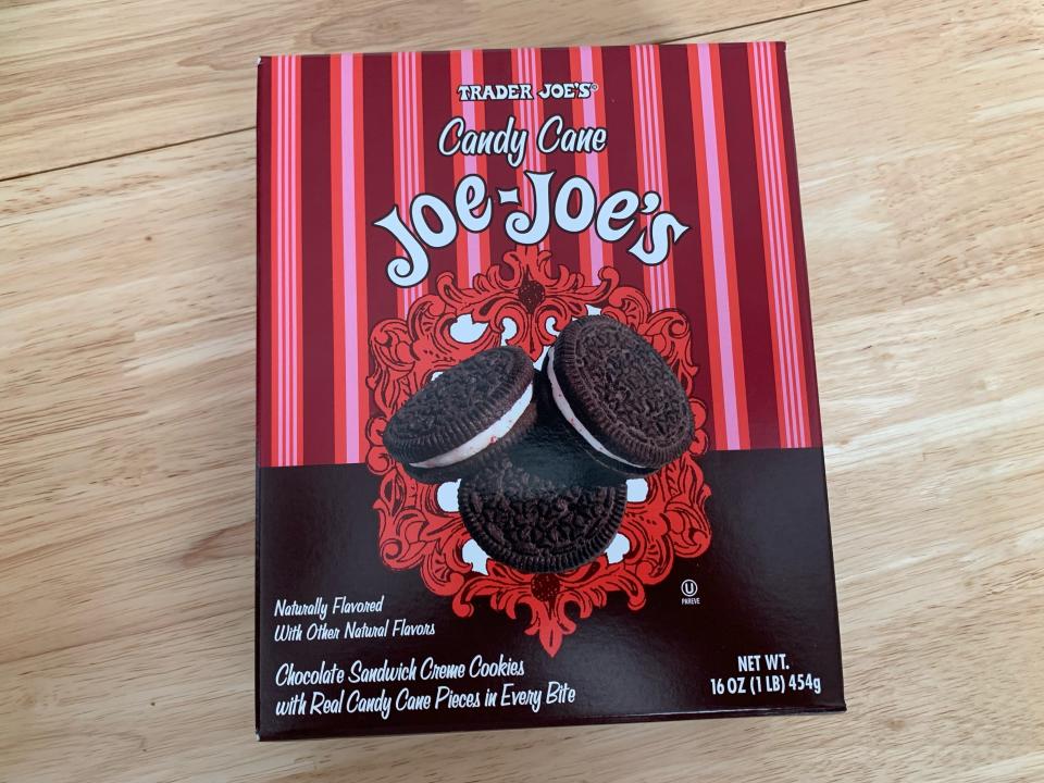 red box of trader joes candy cane joe-joes on wooden table