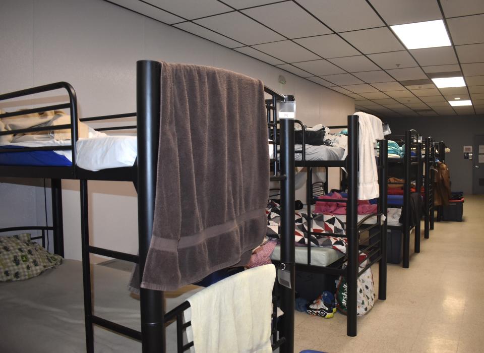 The bunking area for the men's quarter at Share the Warmth of Lenawee, the county's homeless shelter in Adrian, is pictured Thursday, Dec. 21, 2023. Share the Warmth of Lenawee operates as a year-round emergency homeless shelter providing a safe and welcoming environment while partnering with community services and resources to encourage self-sufficiency. It holds more than 60 beds and provides more than 21,900 bed-nights per year.