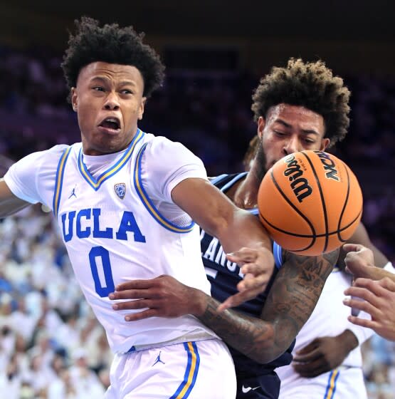 Los Angeles, California November 12, 2021: UCLA's Jaylen Clark battles for loose ball.