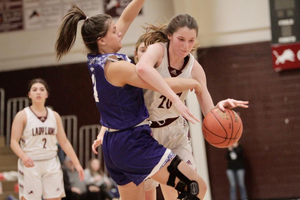 Brownwood's Tessa Goodwin dribbles into a Lampasas defender.