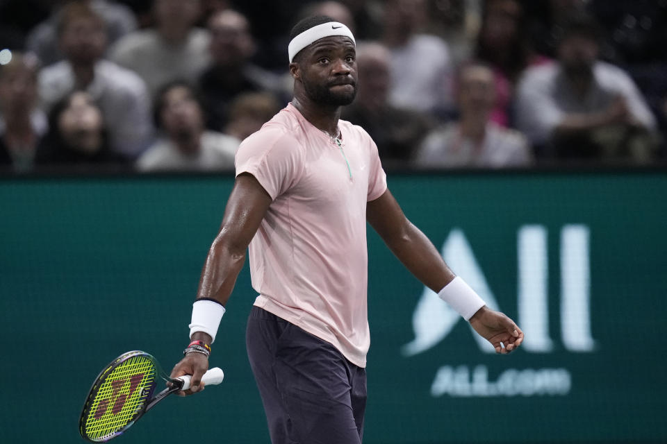 Frances Tiafoe of the U.S reacts as he plays Felix Auger-Aliassime of Canada during their quarterfinal match of the Paris Masters tennis tournament at the Accor Arena, Friday, Nov. 4, 2022 in Paris. (AP Photo/Thibault Camus)