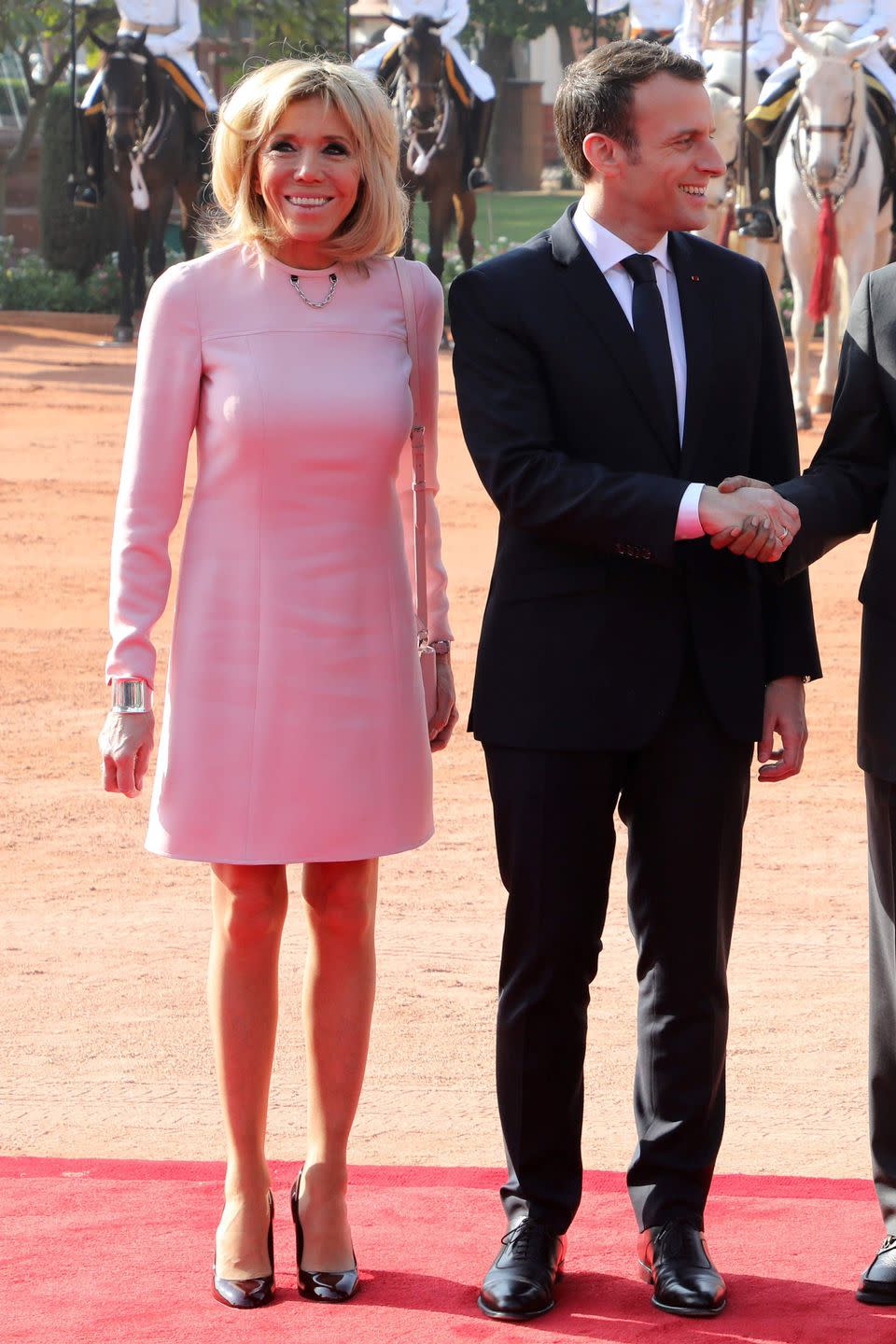 <p>Wearing a long sleeve pink dress during a ceremonial reception in New Delhi. </p>