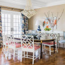 <p>Bold patterns in striking blues and vivid corals pack a colorful punch in this dining room, which seamlessly blends super traditional pieces, like the stately table and mirrored console, with groovier pieces, like the Chippendale chairs and an artfully marbled lamp.</p> <p><strong>Idea Spotlight</strong></p> <p>Bring the beach inside. In this Cohasset, Massachusetts, dining room, a mother-of-pearl shell chandelier dresses down the room’s more formal elements and connects the space to the Atlantic Ocean just steps from the house. </p>