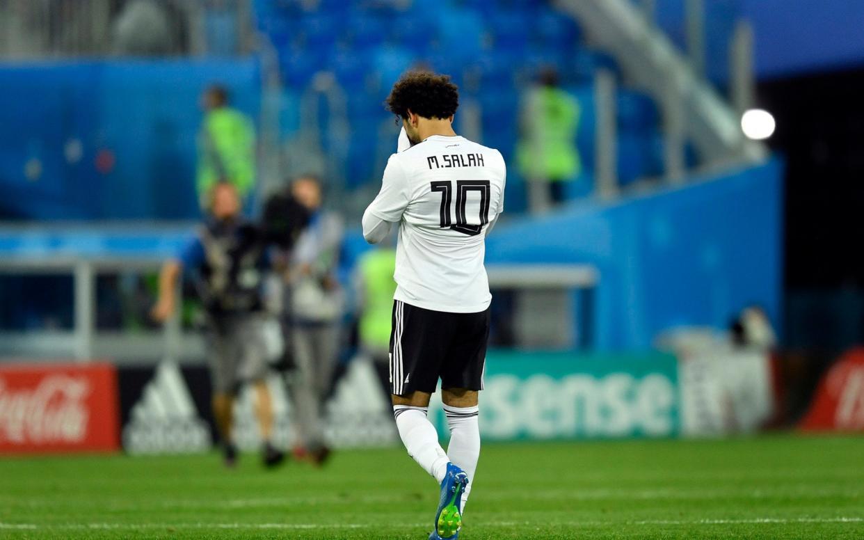 Not fit: Mo Salah was a forlorn figure as his Egypt side went down 3-1 to the hosts - AP