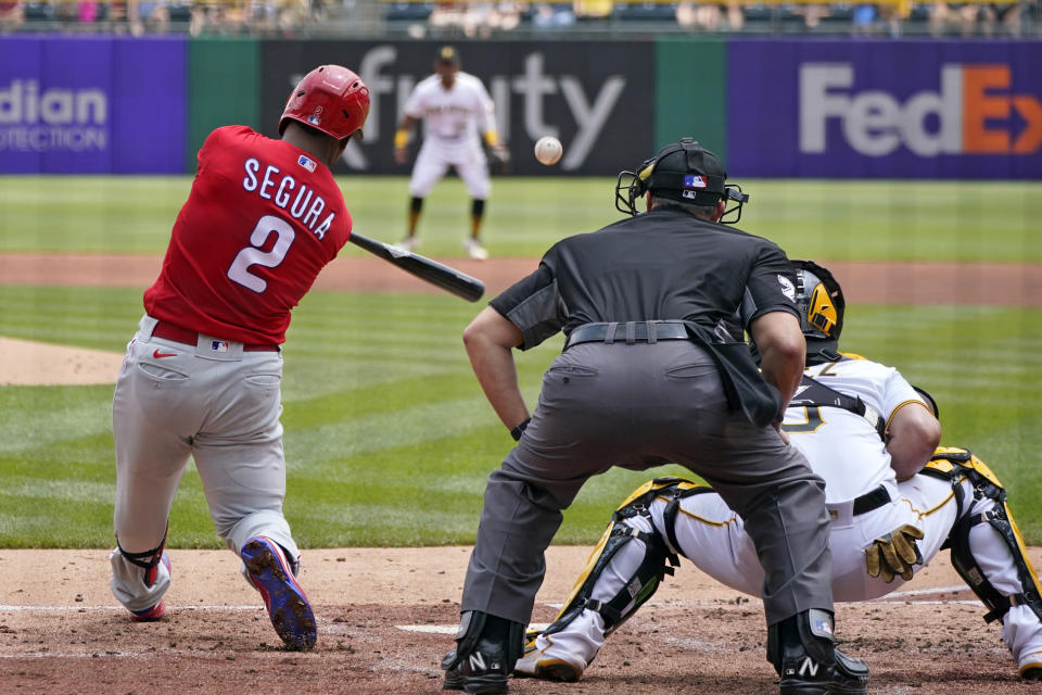 Philadelphia Phillies' Jean Segura (2) doubles off Pittsburgh Pirates starting pitcher Mitch Keller, driving in two runs, during the second inning of a baseball game in Pittsburgh, Sunday, Aug. 1, 2021. (AP Photo/Gene J. Puskar)