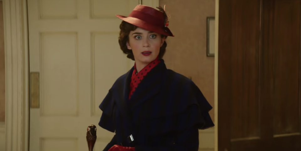 A still of Emily Blunt as Mary Poppins standing in the hallway looking shocked