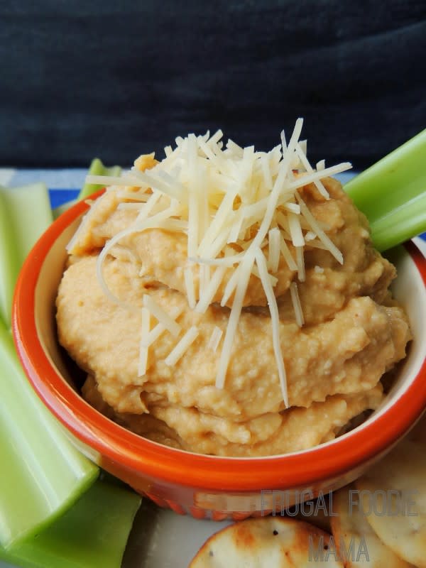 <p>The Frugal Foodie Mama</p><p>This best flavors of the Super Bowl fuse together in this flavorful dip. </p><p><strong>Get the recipe: <a href="http://www.thefrugalfoodiemama.com/2014/01/buffalo-parmesan-hummus.html" rel="nofollow noopener" target="_blank" data-ylk="slk:Buffalo Parmesan Hummus;elm:context_link;itc:0;sec:content-canvas" class="link ">Buffalo Parmesan Hummus</a></strong></p><p><strong>Related: <a href="https://parade.com/842974/jennybullistron/25-recipes-using-buffalo-sauce-that-arent-wings/" rel="nofollow noopener" target="_blank" data-ylk="slk:30 Best Buffalo Sauce Recipes That Aren't Wings;elm:context_link;itc:0;sec:content-canvas" class="link ">30 Best Buffalo Sauce Recipes That Aren't Wings</a></strong></p>