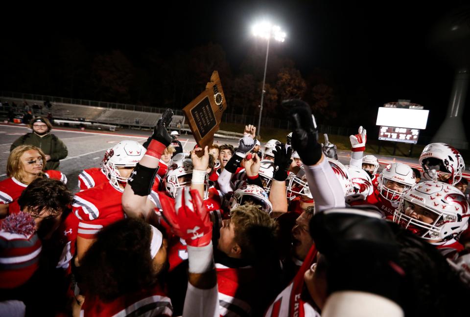 The Nixa Eagles celebrate after they beat the Joplin Eagles to claim the Class 6 District 5 championship at Nixa on Friday, Nov. 11, 2023.