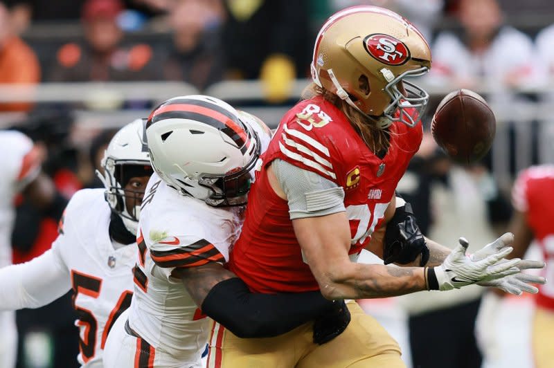 San Francisco 49ers tight end George Kittle (R) attempts to catch a pass against the Cleveland Browns on Sunday in Cleveland. File Photo by Aaron Josefczyk/UPI