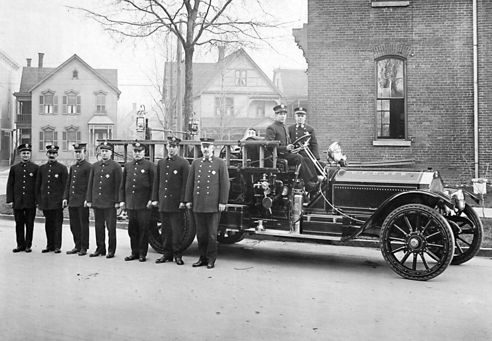 East Utica’s population began to grow in the 1880s as more and more knitting mills and other industries opened along Broad Street. The number of houses grew with the number of people so the Utica Fire Department opened Engine 5 firehouse at the southeast corner of Albany and Blandina streets. It was closed after nearly 100 years of service. It received its first motor rig in 1915— a LaFrance 750 GPM pumper. Behind the wheel were Driver Louis Bacon and Captain Dennis Ryan. Standing, left to right, were Firemen Henry Boehlert, Jim Cleary, Gus Gleason and Edward Gwilt, Engineer Lafayette Cummings, Fireman William Garnsey and Lieutenant James McNally.