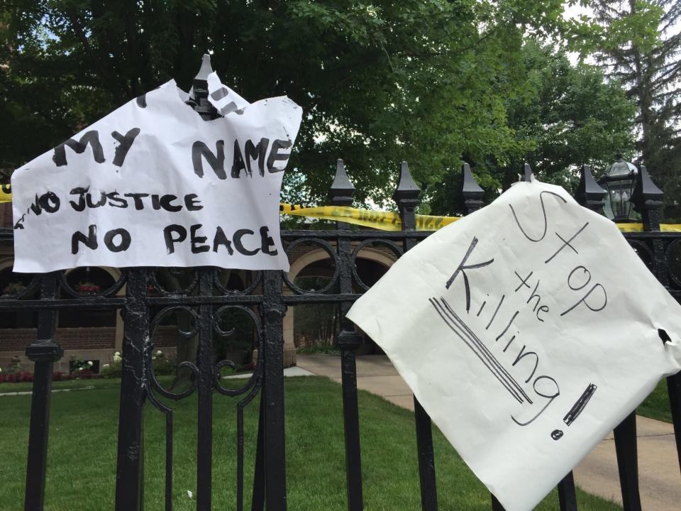 Signs outside the governor's mansion.