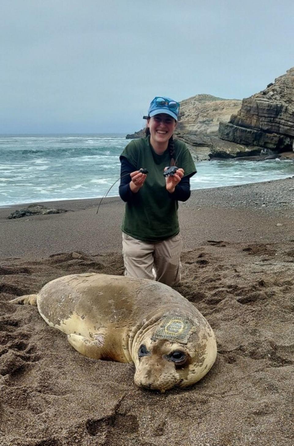 Graduate student Katie Saenger with Monarch, excited that the team successfully retrieved her tags. Activities performed and photo taken under NMFS permit 22187-04 and 27514.