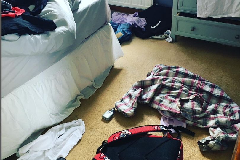Room with clothes on the floor