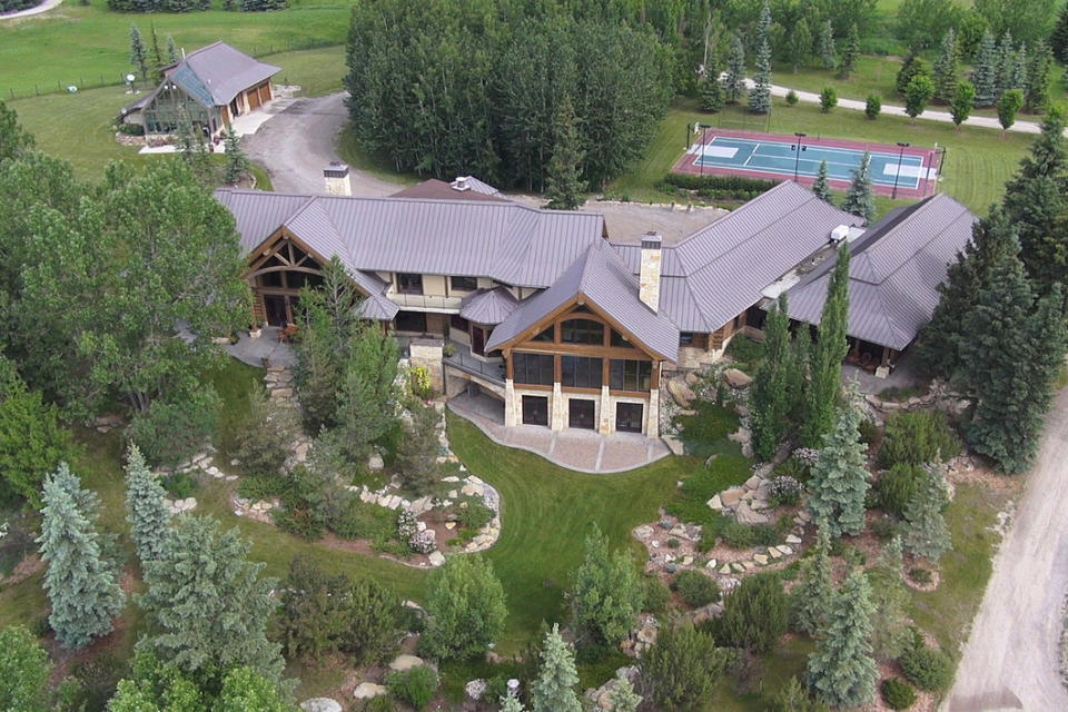 <p>No. 4: <a rel="nofollow noopener" href="http://sothebysrealty.ca/en/property/alberta/calgary-real-estate/calgary/63209/" target="_blank" data-ylk="slk:242004 Range Road 32, Calgary, Alta.;elm:context_link;itc:0;sec:content-canvas" class="link ">242004 Range Road 32, Calgary, Alta.</a><br>List price: $30,000,000<br>Kestrel Ridge Farm isn’t exactly your average farm; the home has six bedrooms and six bathrooms, and sits on 160 acres on the Elbow River. The luxury log home has a tennis court, indoor salt-water swimming pool, and is home to a world-class equestrian and dressage training facility, designed to host National Horse Shows. Last year, the home was No. 6 on the list. (Photo: Sotheby’s International Realty Canada) </p>