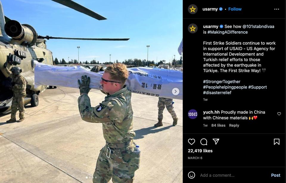 US Army instagram post showing soldier in fatigues carrying supplies with Chinese letters