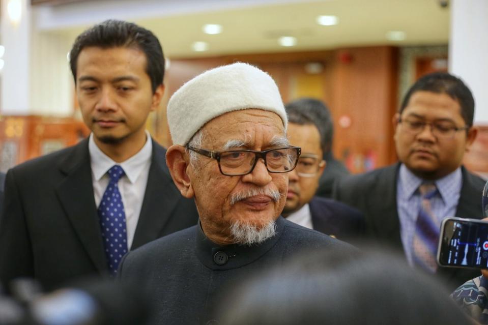 Datuk Seri Hadi Awang speaks to reporters at Parliament lobby October 15, 2019. — Picture by Ahmad Zamzahuri