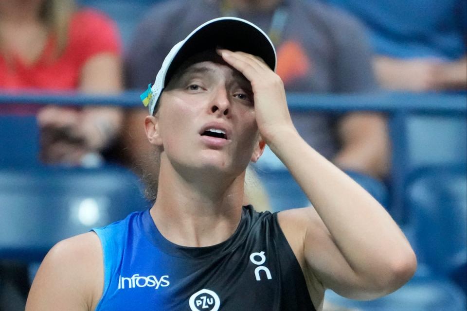 Shock exit: Iga Swiatek was dumped out of the US Open by familiar rival Jelena Ostapenko (AP)