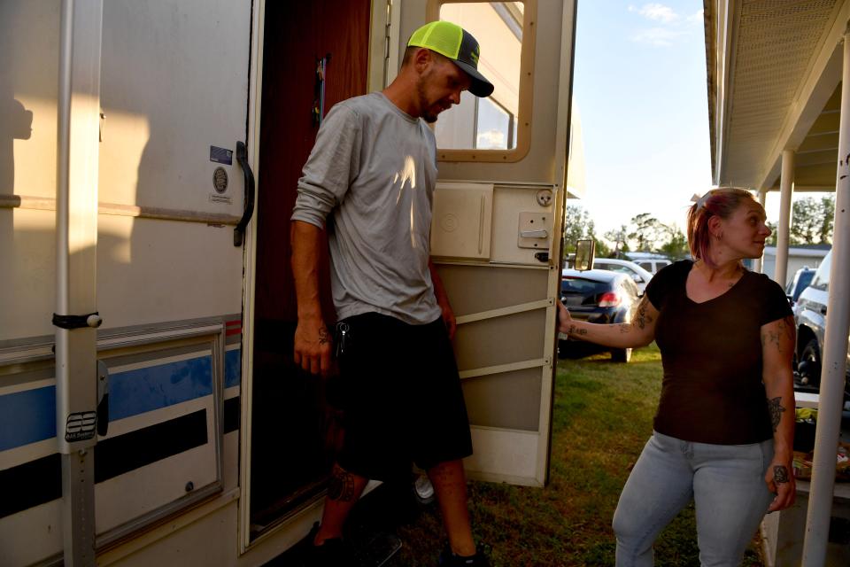 Jessica and Rusty Foltz have been staying in a borrowed 1994 Jamboree RV, parked next to her mother’s home in Port Charlotte. Two of their children have been staying with friends and family so they can be closer to school, but the kids come to stay with them in the RV on the weekends.