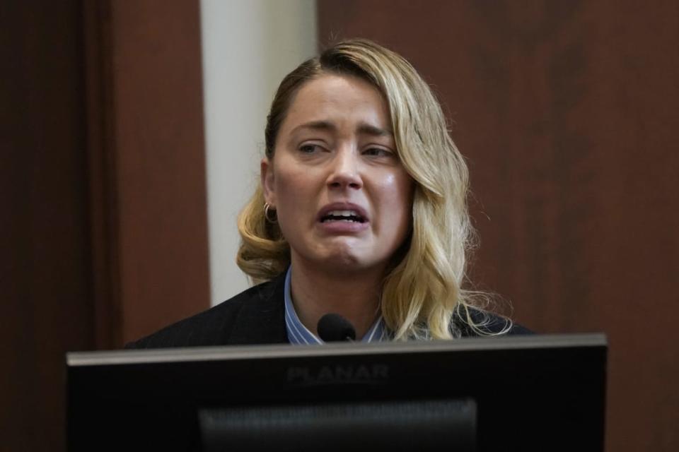 <div class="inline-image__caption"> <p>Amber Heard testifies about the first time her ex-husband, actor Johnny Depp hit her at Fairfax County Circuit Court during a defamation case against her by Depp in Fairfax, Virginia, on May 4, 2022.</p> </div> <div class="inline-image__credit"> Elizabeth Frantz/AFP/Getty </div>