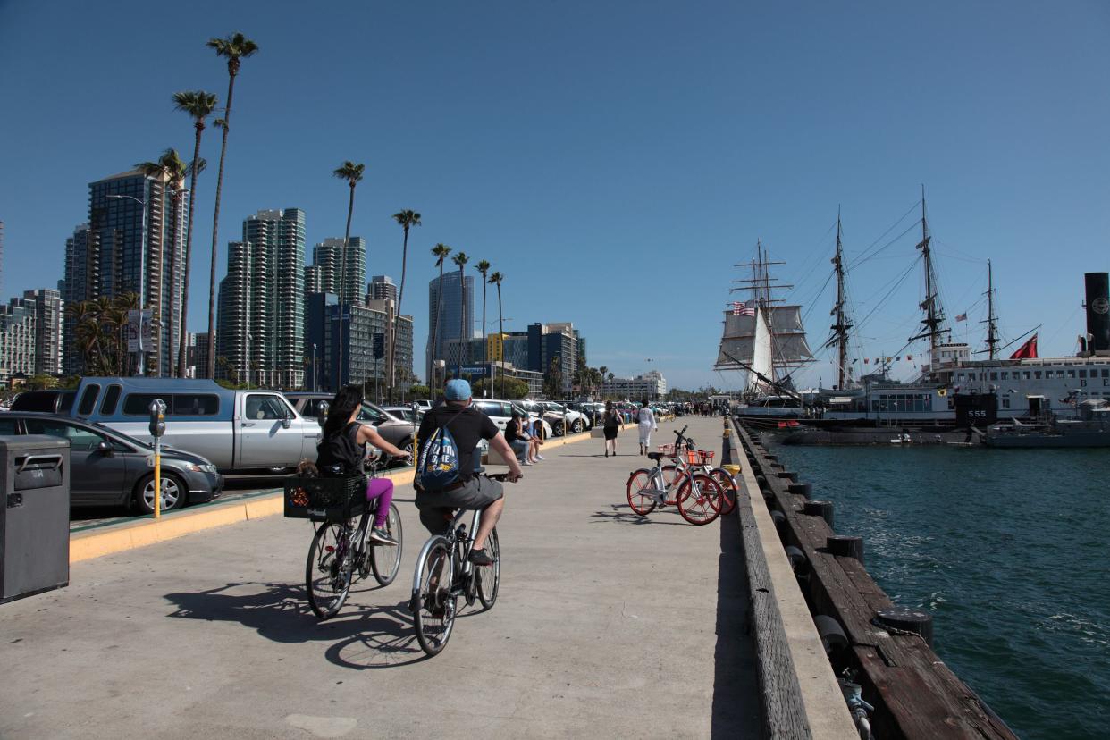 people biking along San Diego Bay