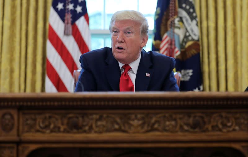 U.S. President Trump answers questions during an interview with Reuters in the Oval Office of the White House in Washington