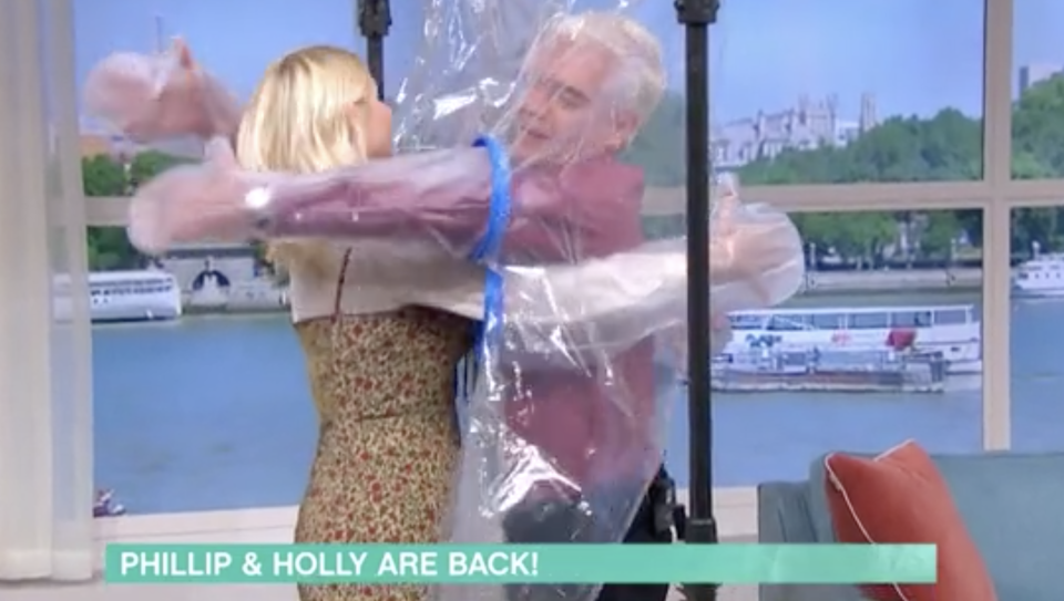 Phillip Schofield and Holly Willoughby were able to embrace with help from a 'cuddle curtain'. (ITV)