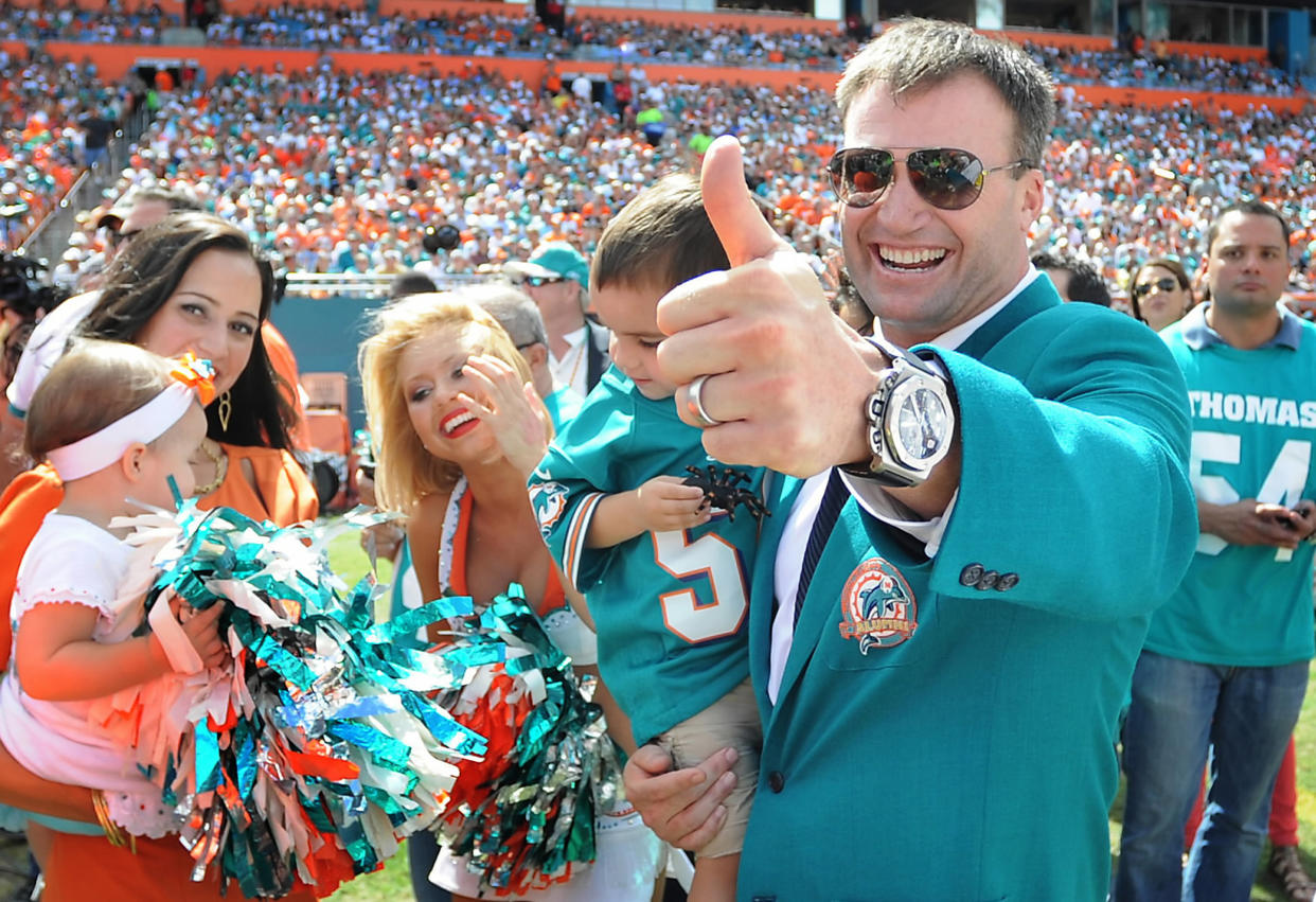 Former Miami Dolphins linebacker Zach Thomas gives a thumbs up as he prepares to be inducted into the Dolphins Ring of Honor on Oct. 14, 2012. (Robert Duyos/Sun Sentinel/Tribune News Service via Getty Images)