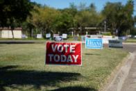 A voting sign is seen outside of a polling site in McAllen