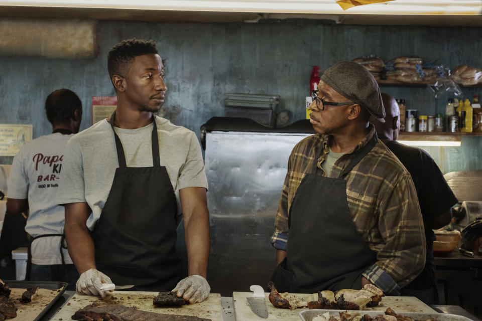 This image released by Netflix shows Mamoudou Athie, left, and Courtney B. Vance in a scene from "Uncorked." (Nina Robinson/Netflix via AP)