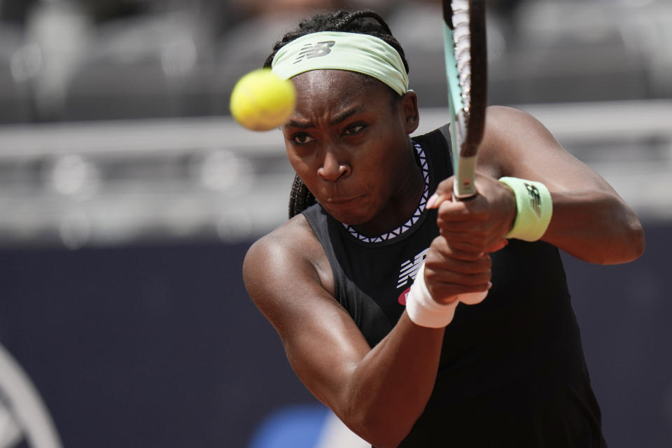 FILE - Coco Gauff of the United States returns the ball to Yulia Putintseva, of Kazakhstan, during their match at the Italian Open tennis tournament, in Rome, Thursday, May 11, 2023. Play begins at the French Open on Sunday, May 28, 2023. (AP Photo/Alessandra Tarantino, File)