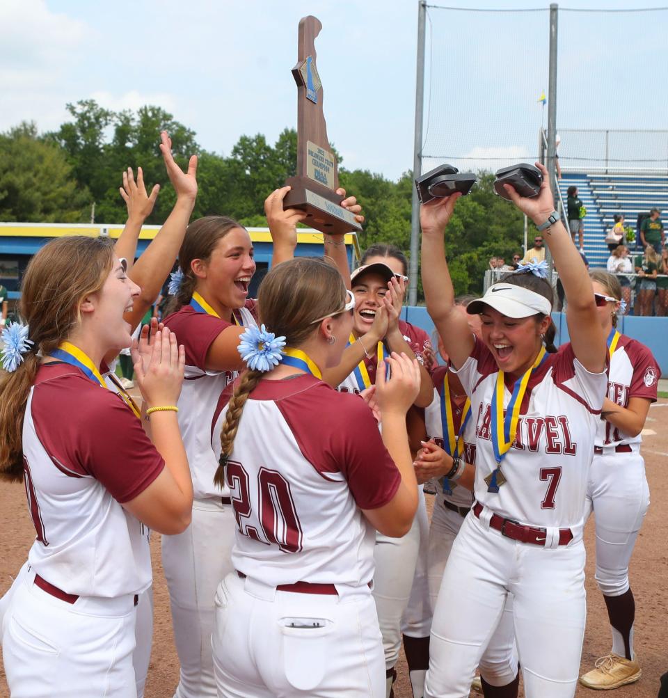 Caravel comes away with the title trophy after beating Indian River 7-0 in the DIAA state championship game at the University of Delaware, Saturday, June 3, 2023.