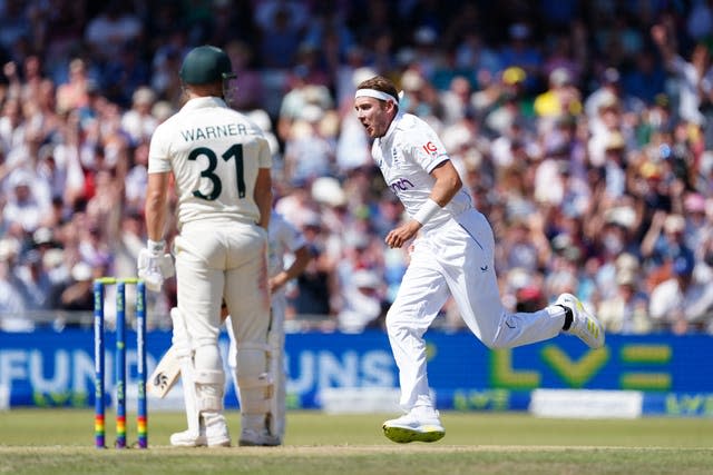 Stuart Broad, right, continued his stranglehold over David Warner at Headingley (Mike Egerton/PA)