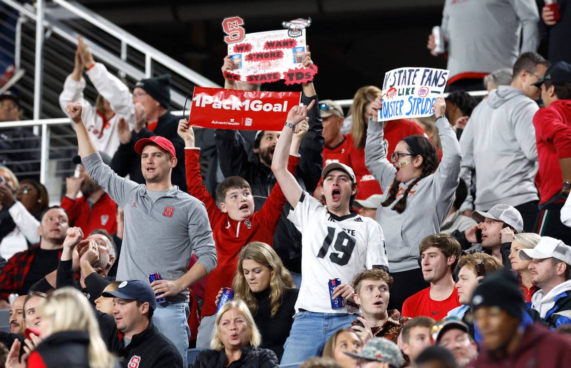 Wolfpack fans cheer during the first half of N.C. State’s game against Kansas State in the Pop-Tarts Bowl at Camping World Stadium in Orlando, Fla., Thursday, Dec. 28, 2023. Ethan Hyman/ehyman@newsobserver.com