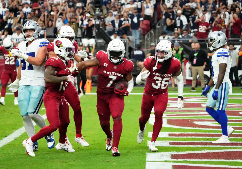 Sep 24, 2023; Glendale, Arizona, USA; Arizona Cardinals linebacker Kyzir White (7) intercepts a Dallas Cowboys pass in the end zone in the second half at State Farm Stadium. Mandatory Credit: Rob Schumacher-Arizona Republic