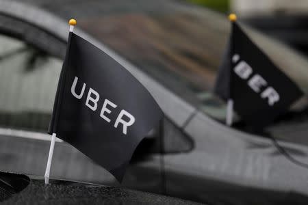 Uber drivers' cars are parked outside the Ministry of Transportation building during a protest in Taipei, Taiwan February 26, 2017. REUTERS/Tyrone Siu