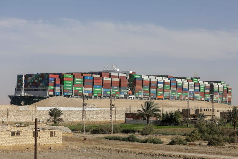 FILE PHOTO: Ship Ever Given, one of the world's largest container ships, is seen after it was fully floated in Suez Canal