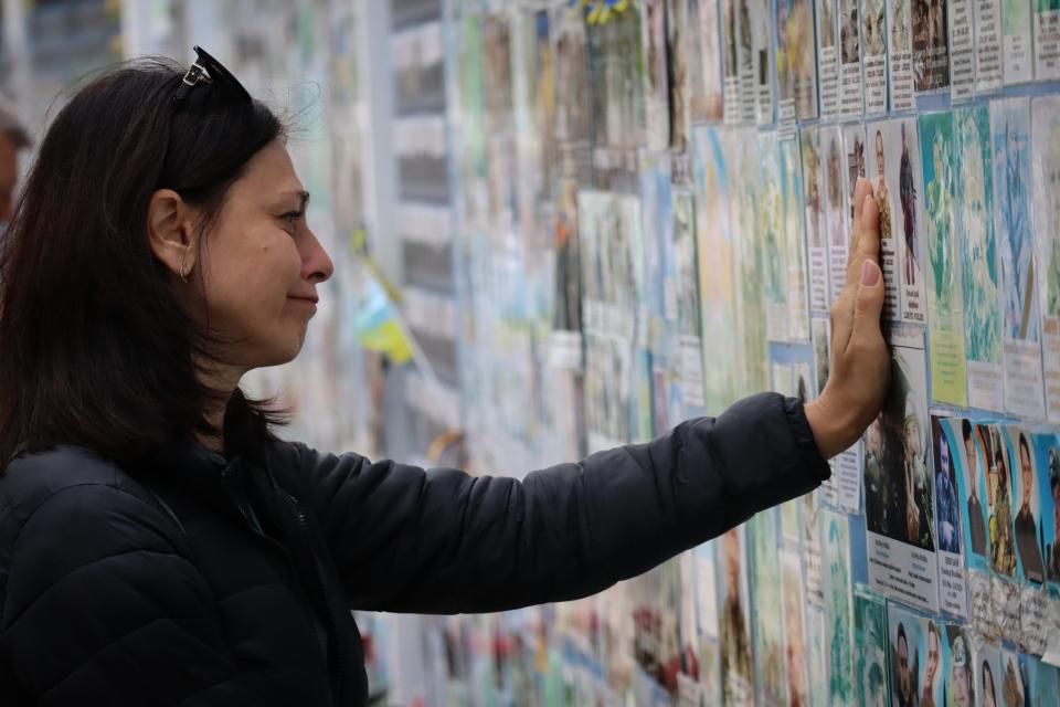 Relatives of fallen Ukrainian soldiers near the wall of memory in Kyiv (Global Images Ukraine via Getty)