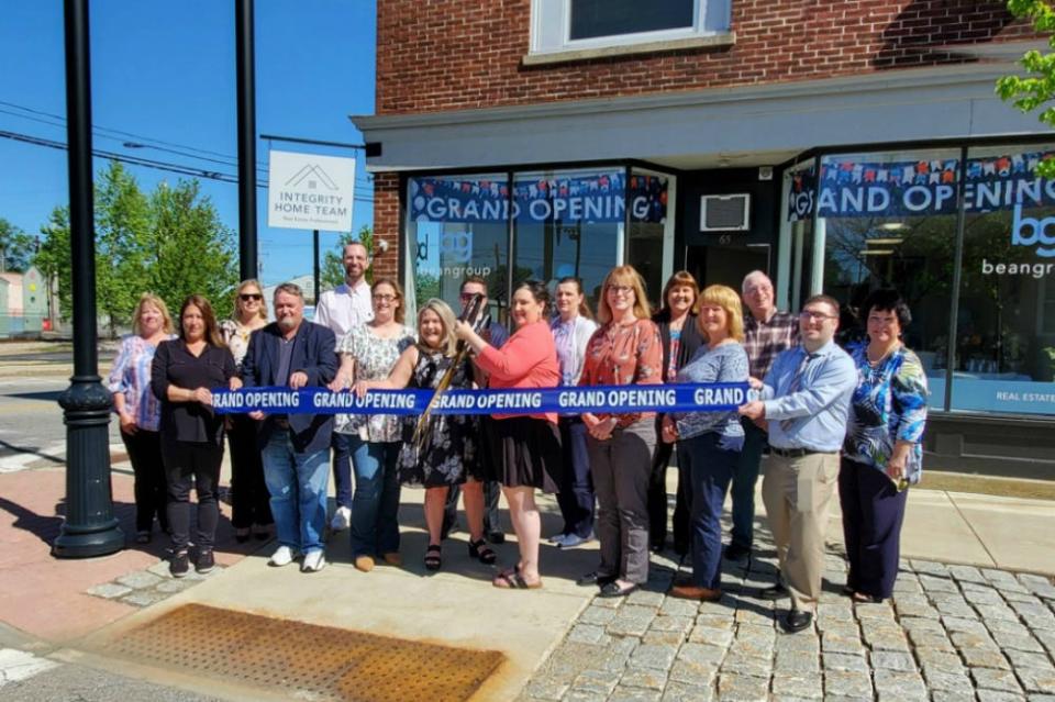 The Greater Rochester Chamber of Commerce held a ribbon cutting recently for Integrity Home Team at Bean Group. From left to right are Kristen White, Northeast Credit Union; Jennifer Marsh, Rochester Economic Development; Tatjana Simon, Northeast Credit Union; Alan Johnson, Breezeline; Matt Wyatt, City of Rochester; Kelley Patterson, INTEGRITY HOME TEAM at Bean Group; Nicole Daigle, Integrity Home Team at Bean Group; Chris Harrelson, Profile Bank; Sarah O’Brien, Integrity Home Team at Bean Group; Carole Glenn, Rochester Economic Development; Sharla Rollins, First Seacoast Bank; Mary Henderson, Bank of New Hampshire; Janet Oliver, Unitil; Harrison Thorp, The Rochester Voice; Ben Coakley, Greater Rochester Chamber of Commerce and Rochester Chamber President Laura Ring.