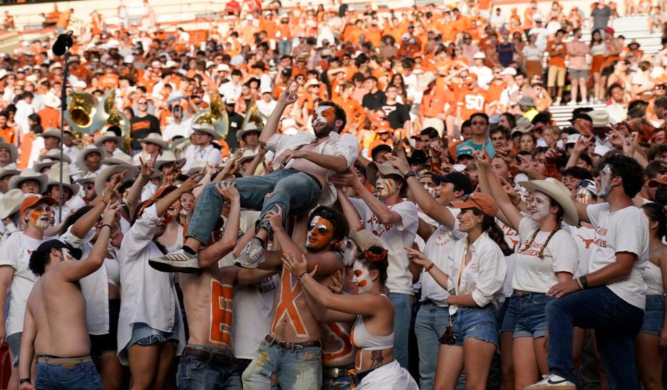 Longhorns fans celebrate in the second half against the Ragin' Cajuns.