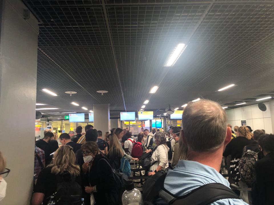 The line for passport control at Amsterdam Schiphol Airport.