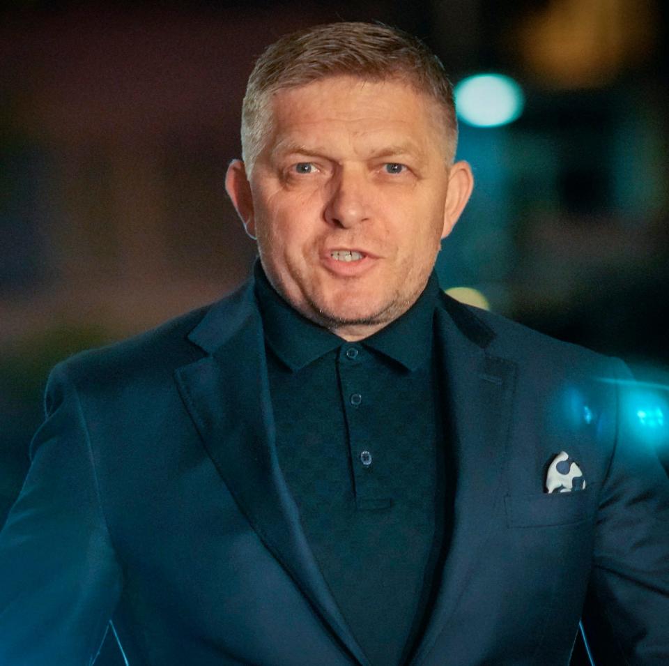 Former Prime Minister Robert Fico arrives to his party's headquarters after polling stations closed for an early parliamentary election, in Bratislava
