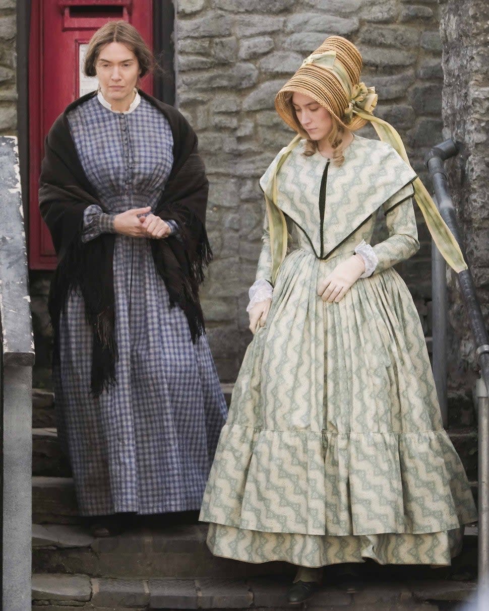 Kate Winslet and Saoirse Ronan on the set of new period drama 'Ammonite' on March 13, 2019 in Lyme Regis, England.