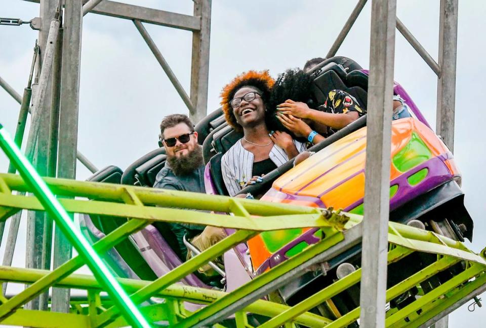 Fairgoers ride the Galaxy rollercoaster Oct. 7 during opening day of the 32nd annual Georgia National Fair.