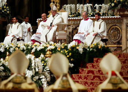 Pope Francis leads the Easter vigil Mass in Saint Peter's Basilica at the Vatican, April 20, 2019. REUTERS/Remo Casilli