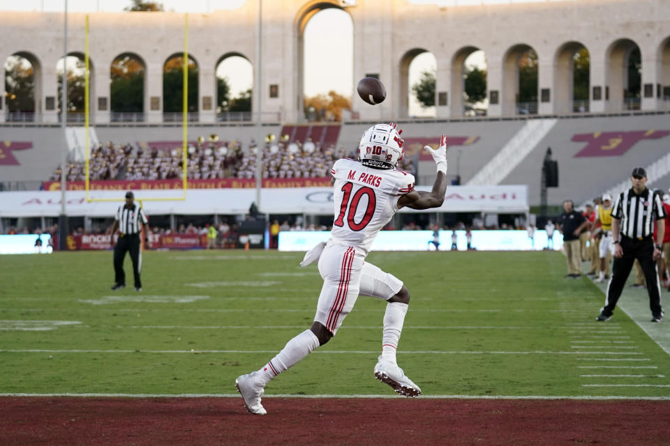 Utah wide receiver Money Parks (10) makes a touchdown catch during the first half of the team's NCAA college football game against Southern California on Saturday, Oct. 9, 2021, in Los Angeles. (AP Photo/Marcio Jose Sanchez)