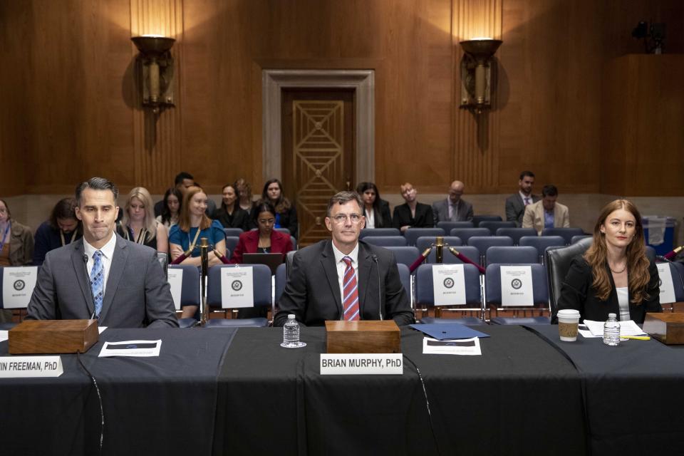 From left, Benjamin Freeman, director of the democratizing foreign policy program at the Quincy Institute for Responsible Statecraft, Brian Murphy, managing director of Logically AI Inc., and Joey Shea, a researcher at Human Rights Watch focusing on Saudi Arabia and United Arab Emirates, appear before a homeland security and governmental affairs subcommittee hearing on Capitol Hill Wednesday, Sept. 13, 2023, regarding the proposed PGA Tour-LIV Golf partnership. (AP Photo/Amanda Andrade-Rhoades)