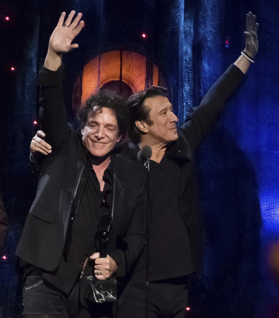 Inductees Neal Schon, left, and Steve Perry from the band Journey appear at the 2017 Rock and Roll Hall of Fame induction ceremony at the Barclays Center on Friday, April 7, 2017, in New York. (Photo by Charles Sykes/Invision/AP)