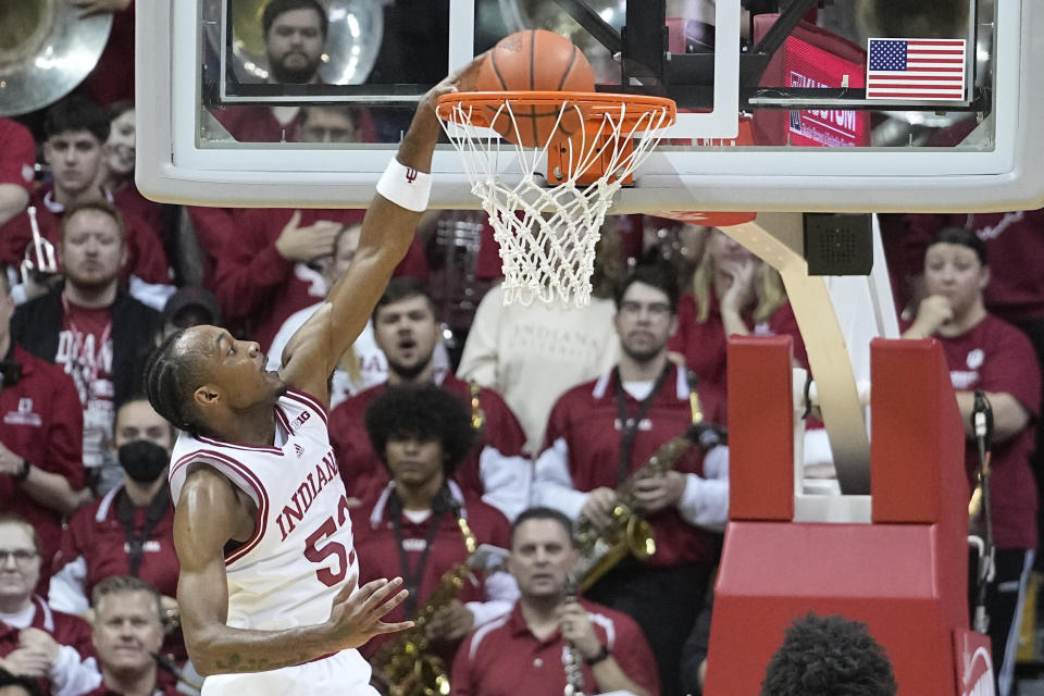 Indiana guard Tamar Bates (53) dunks during the first half of an NCAA college basketball game against Jackson State, Friday, Nov. 25, 2022, in Bloomington, Ind. (AP Photo/Darron Cummings)