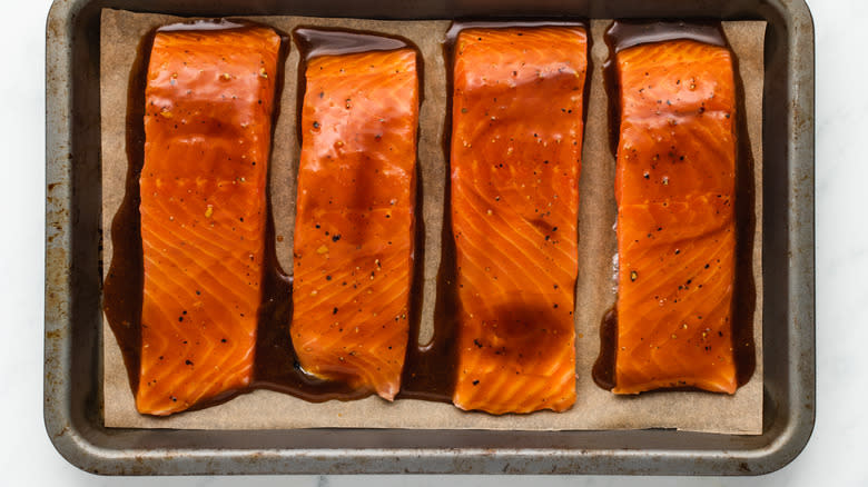 glazed salmon on baking sheet