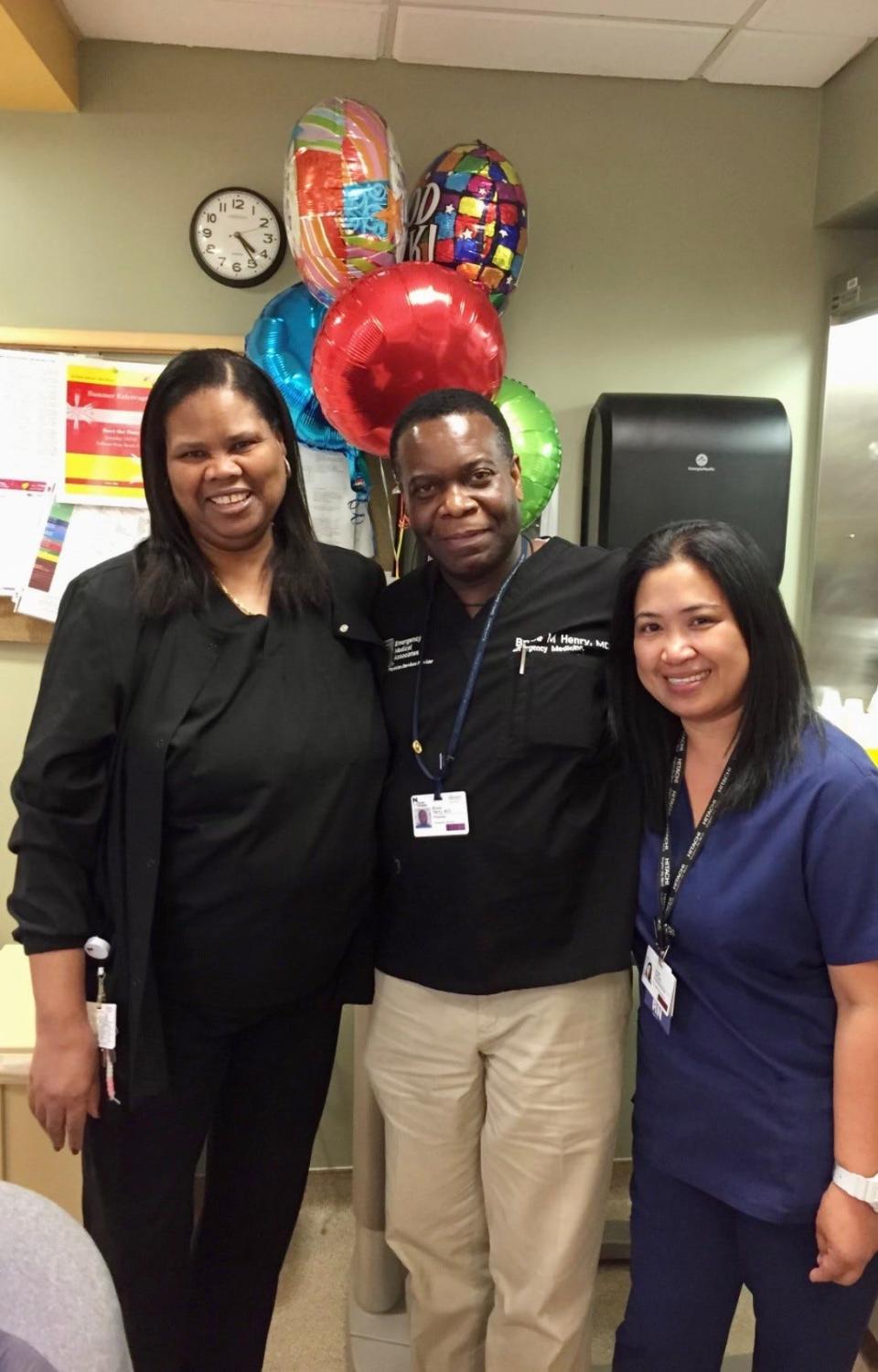 Dr. Bruce Maurice Henry, center, with nurses Claudia Charles, left, and Sarah Samala, right, at Montefiore Nyack Hospital in 2022.